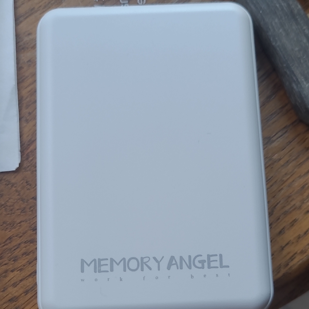 Memory Angel White Portable Device